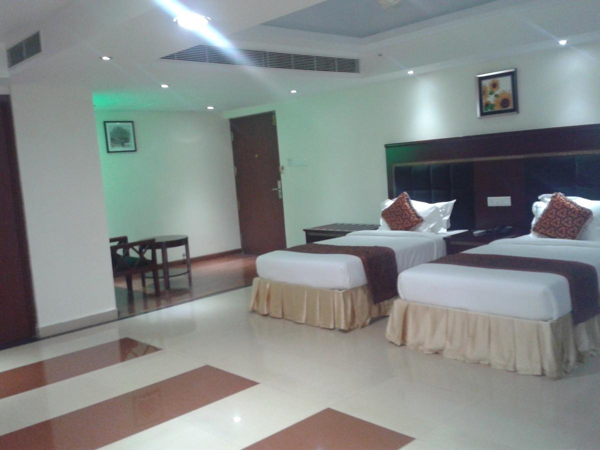 Hotel Hiton Perintalmanna Номер фото